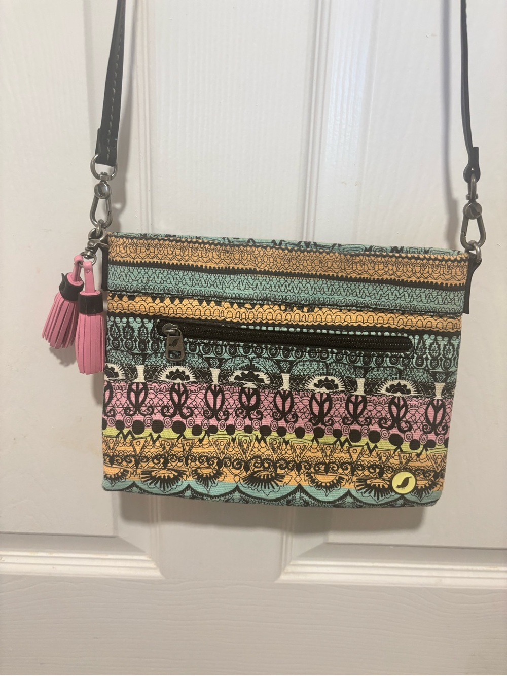 Sakroots Multicolor Striped Pattern Crossbody Bag with Pink Tassel